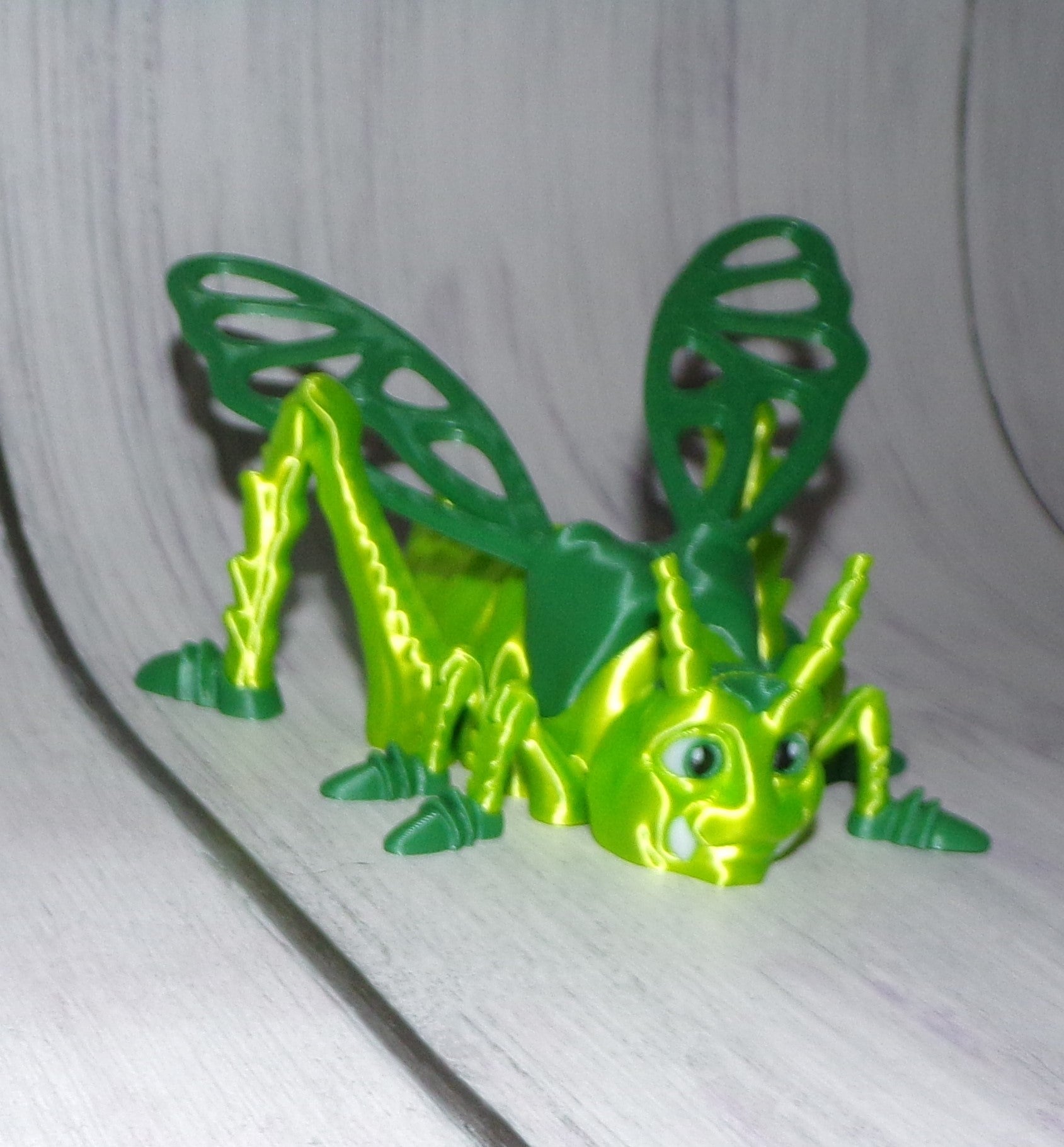 Jimmy the Grasshopper Articulated 3d Printed Figurine - Wonderland 3D Printing 