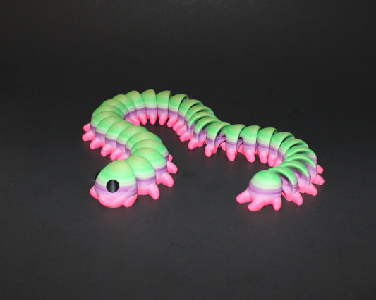 A 3D-printed centipede, measuring 18.5 inches in length, with each piece showcasing a one-of-a-kind rainbow pattern!