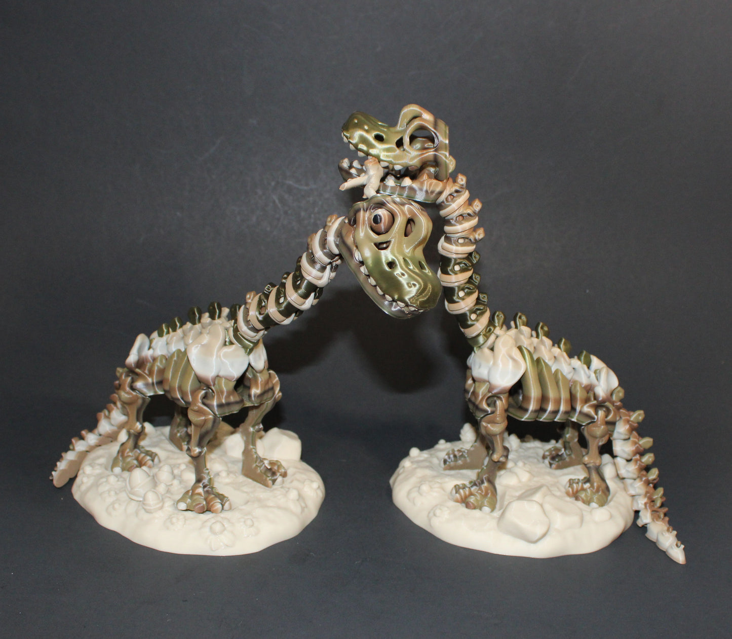 A 3D-printed articulated Brachiosaurs skeleton includes a stand and branch. 7.5" Tall