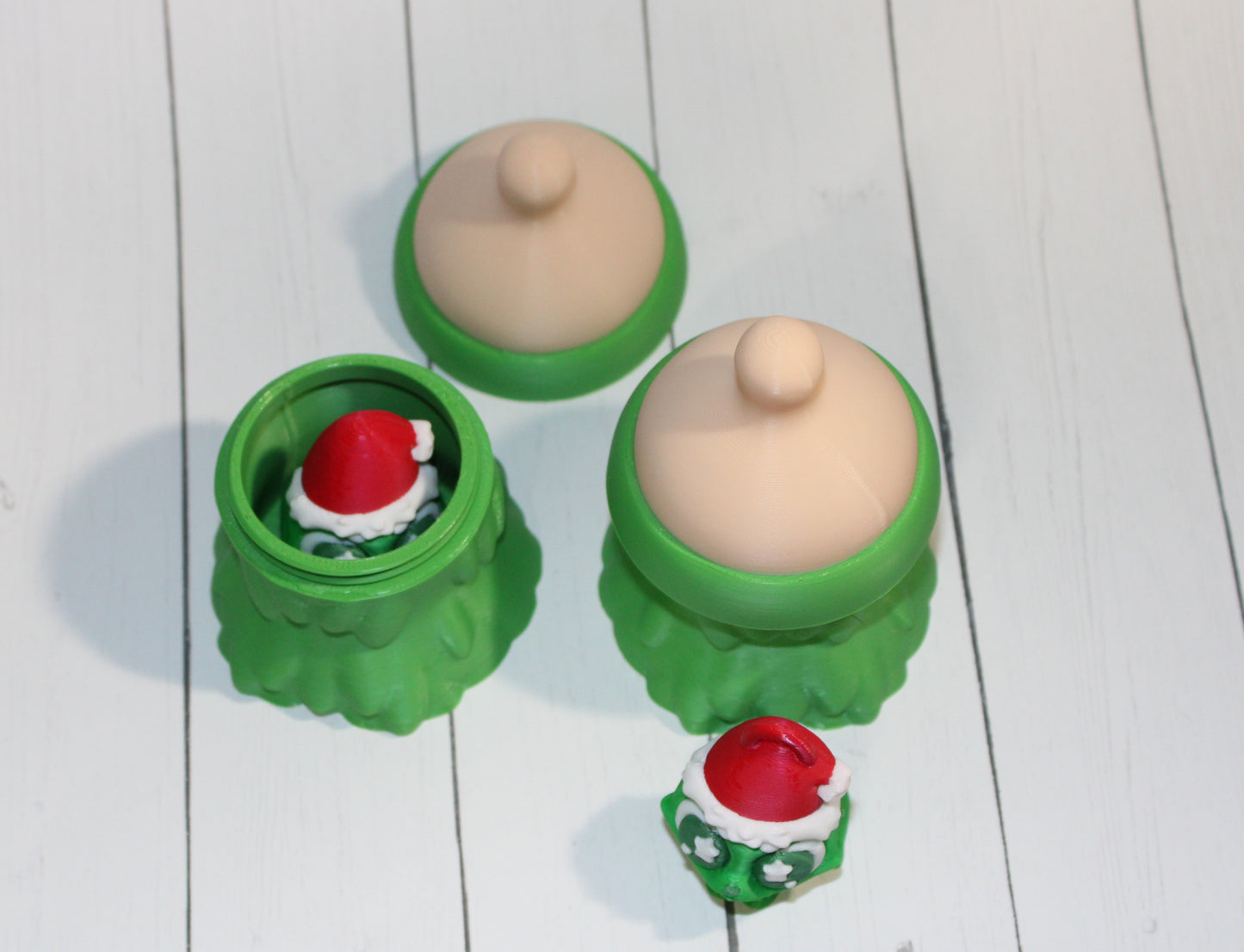3D-printed Christmas Grumpy baby with Baby Bottle Container