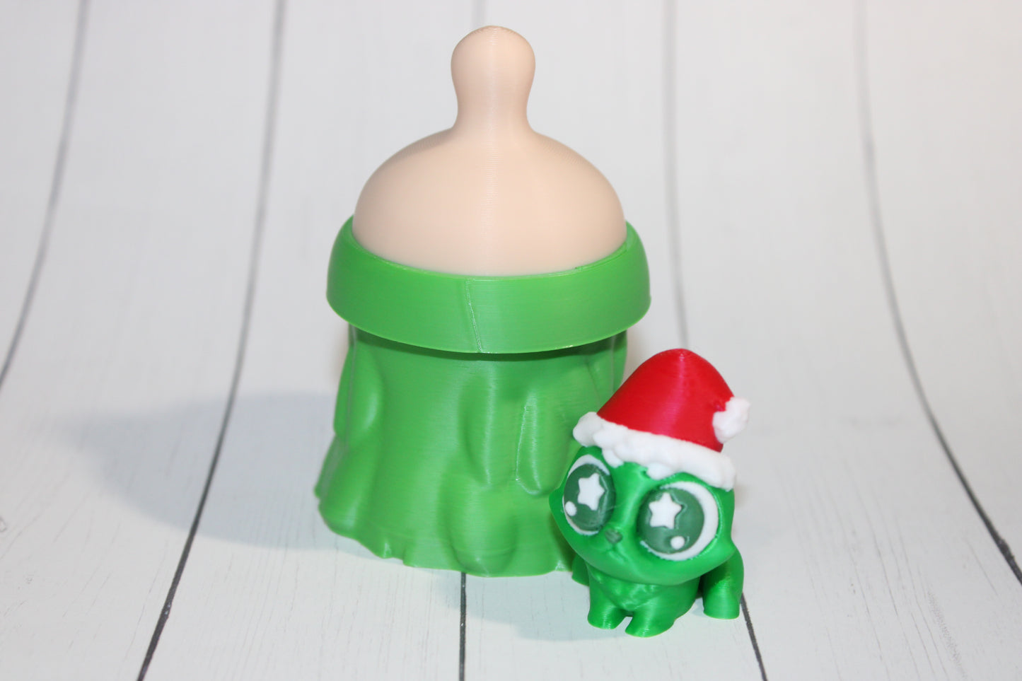 3D-printed Christmas Grumpy baby with Baby Bottle Container