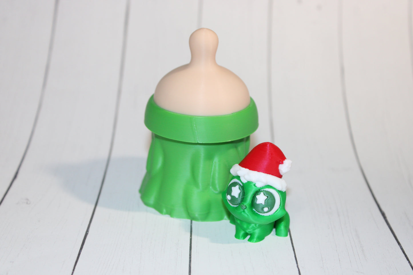 3D-printed Christmas Grumpy baby with Baby Bottle Container