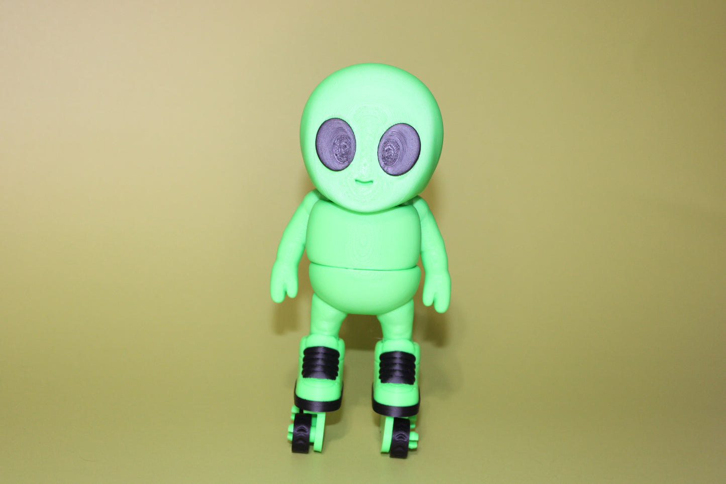 Roller-Skating Alien 6.5 inches Tall -3D Printed Flexi Fidget Figurines - Wonderland 3D Printing 