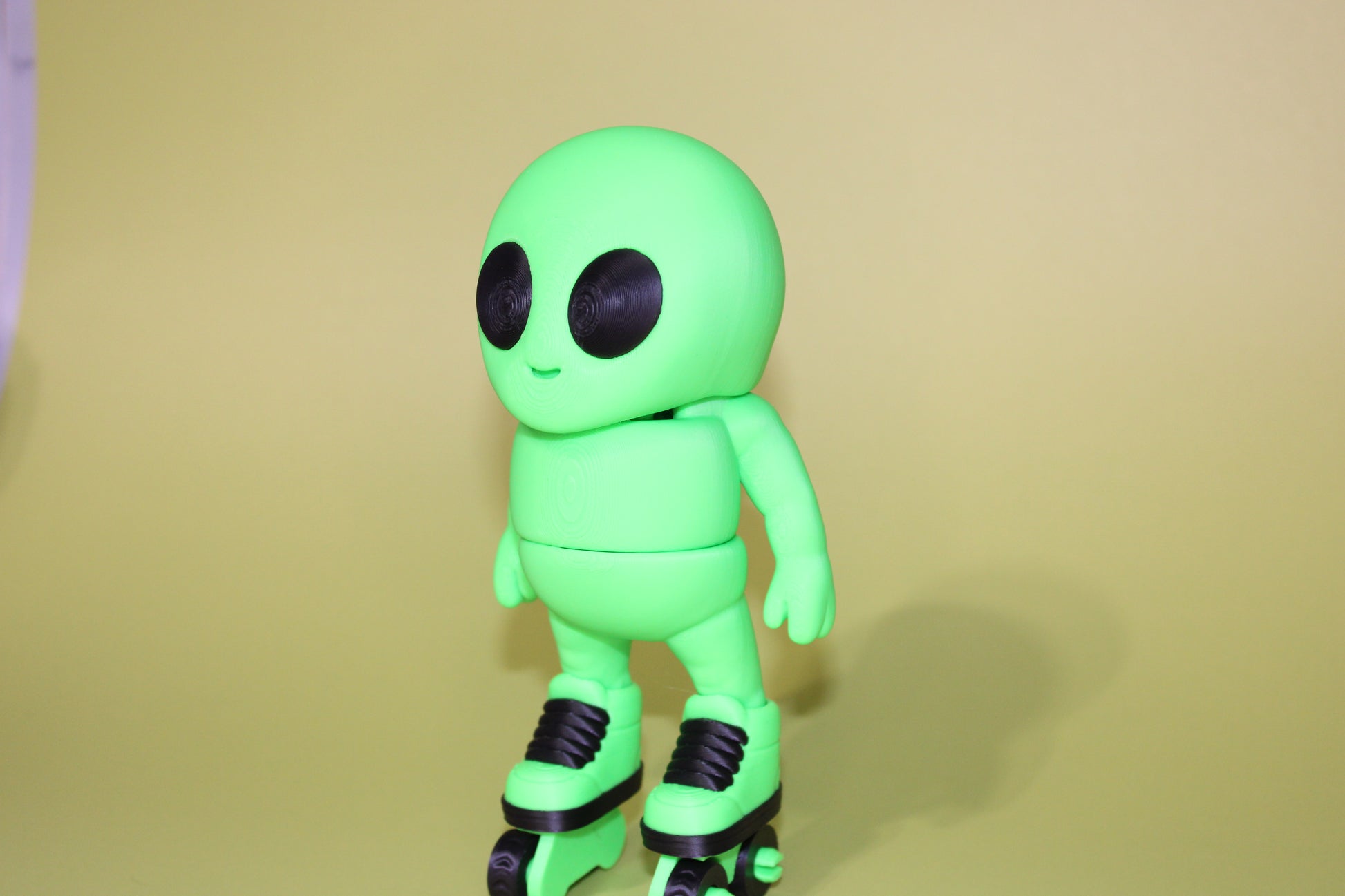 Roller-Skating Alien 6.5 inches Tall -3D Printed Flexi Fidget Figurines - Wonderland 3D Printing 