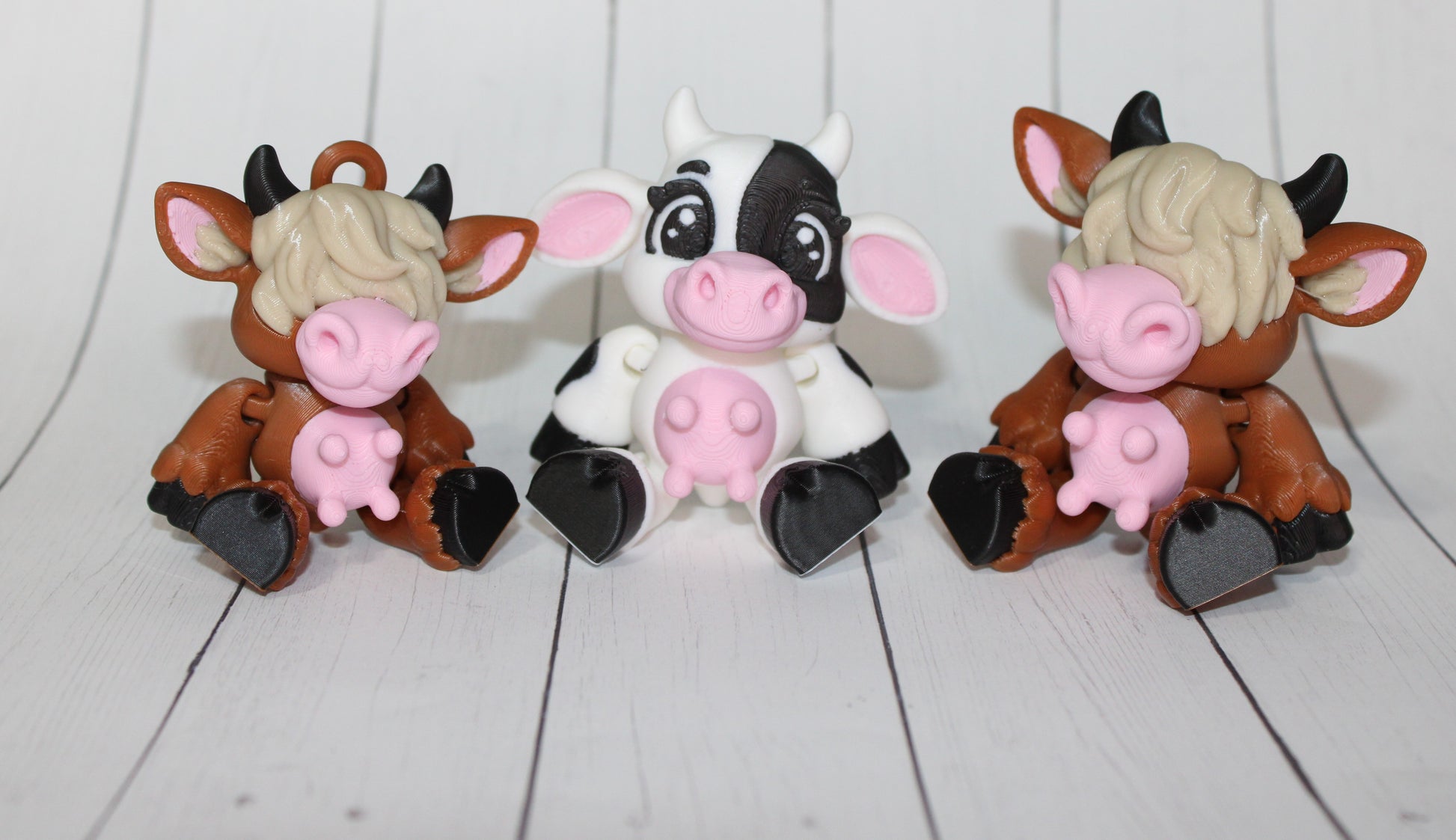 Sitting Cows 3.5 inches :3D Printed Fully Articulated Flexi Fidget Figurine - Wonderland 3D Printing 