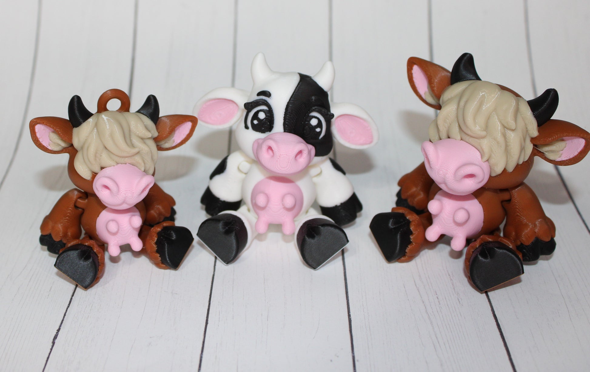 Sitting Cows 3.5 inches :3D Printed Fully Articulated Flexi Fidget Figurine - Wonderland 3D Printing 