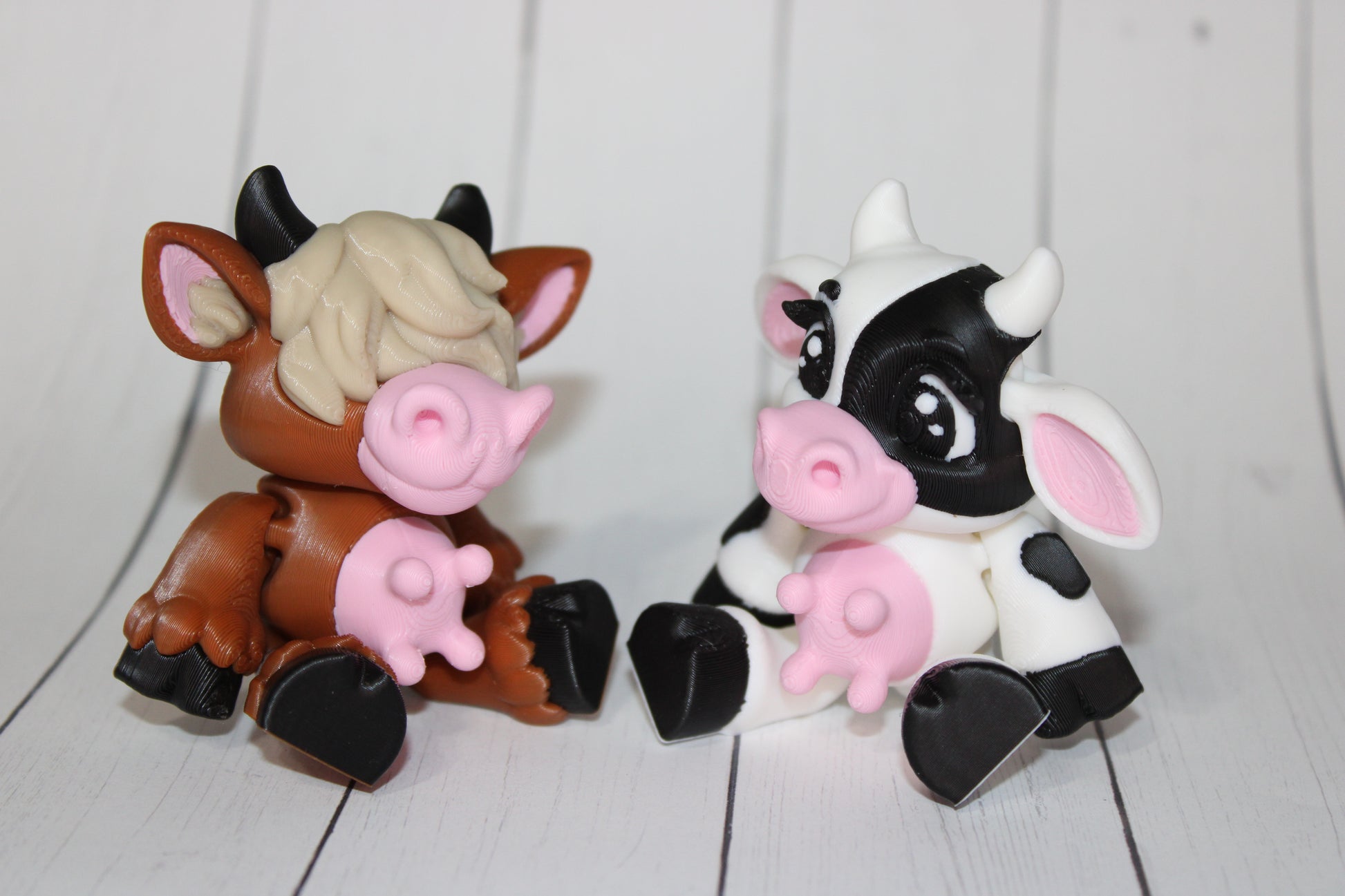 Sitting Cows 3.5 inches :3D Printed Fully Articulated Flexi Fidget Figurine - Wonderland 3D Printing 