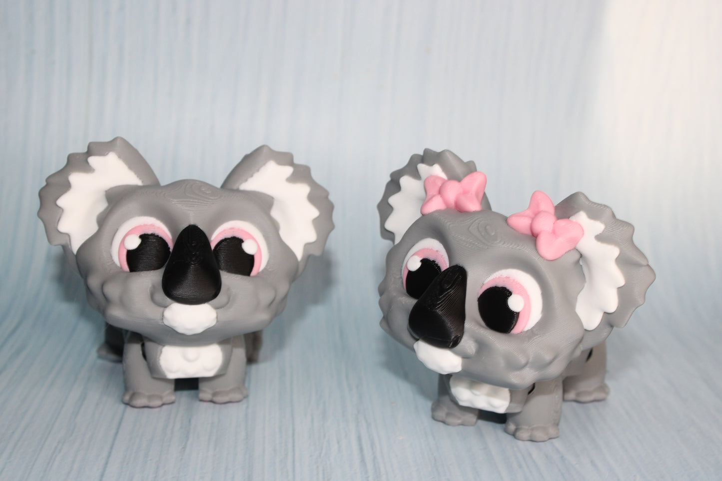 Awareness or Flower Koala – 3D printed, measuring 4.5" long by 3.5" tall. - Wonderland 3D Printing 
