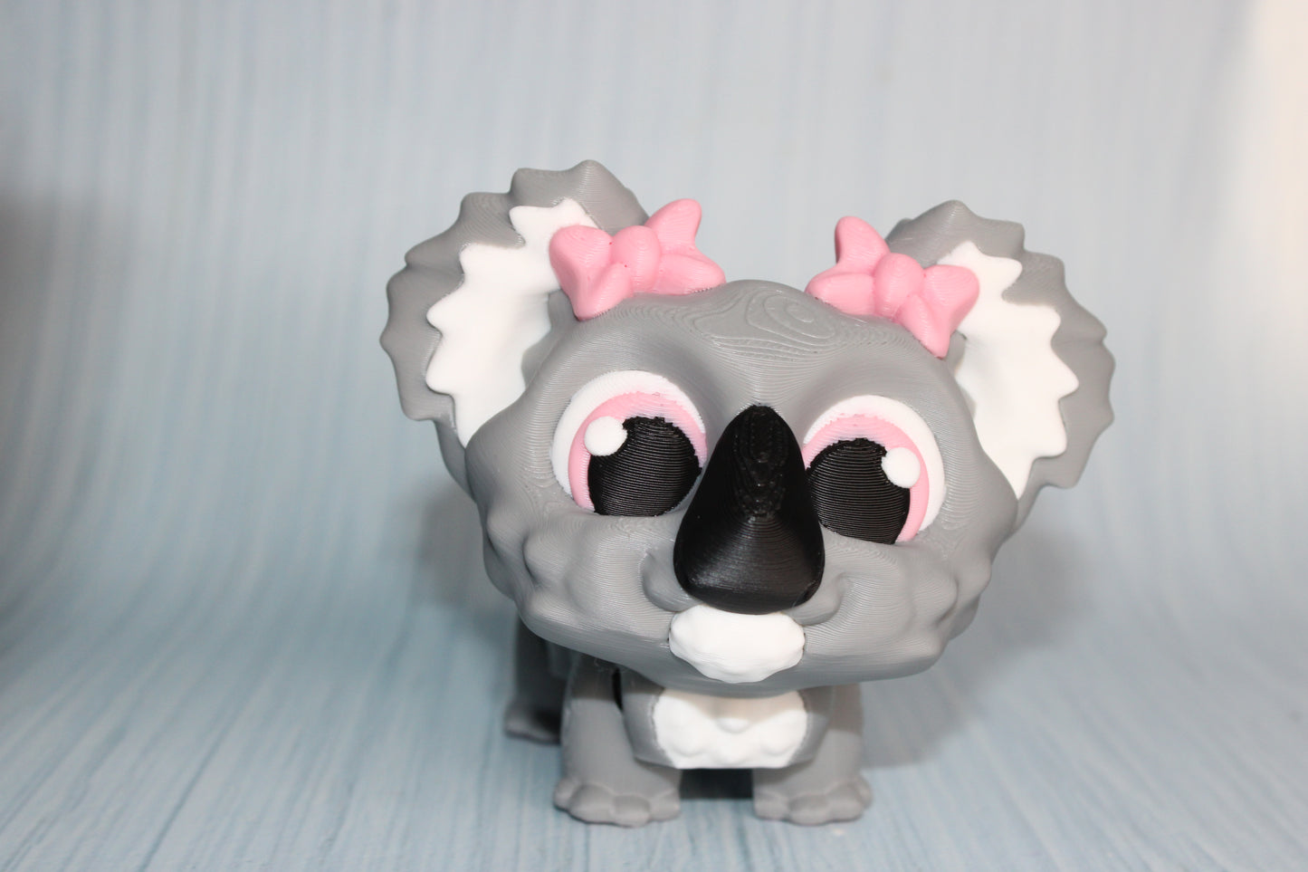 Awareness or Flower Koala – 3D printed, measuring 4.5" long by 3.5" tall. - Wonderland 3D Printing 
