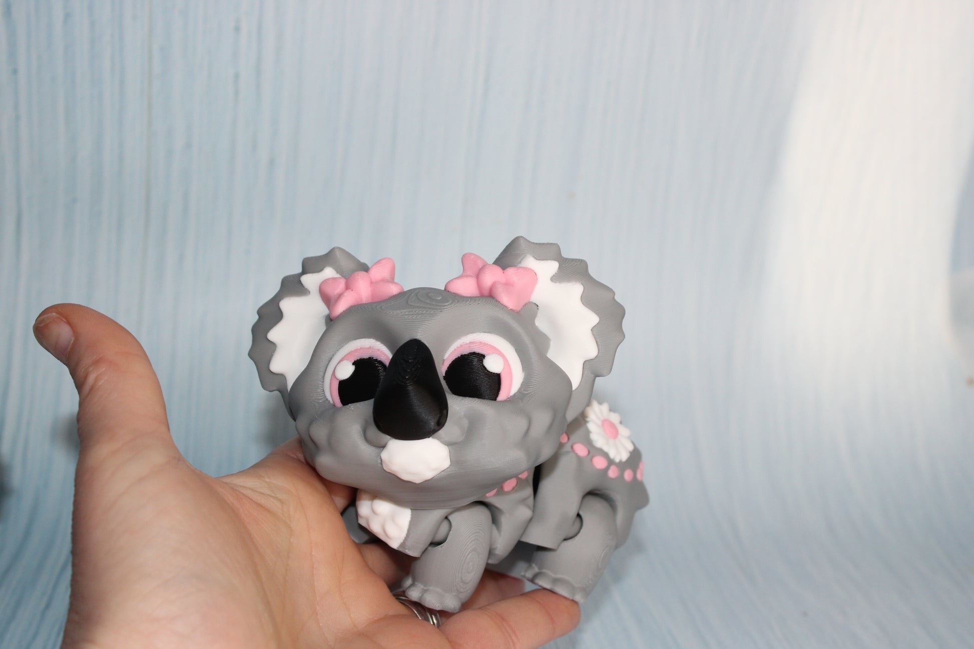 Awareness or Flower Koala – 3D printed, measuring 4.5" long by 3.5" tall. - Wonderland 3D Printing 