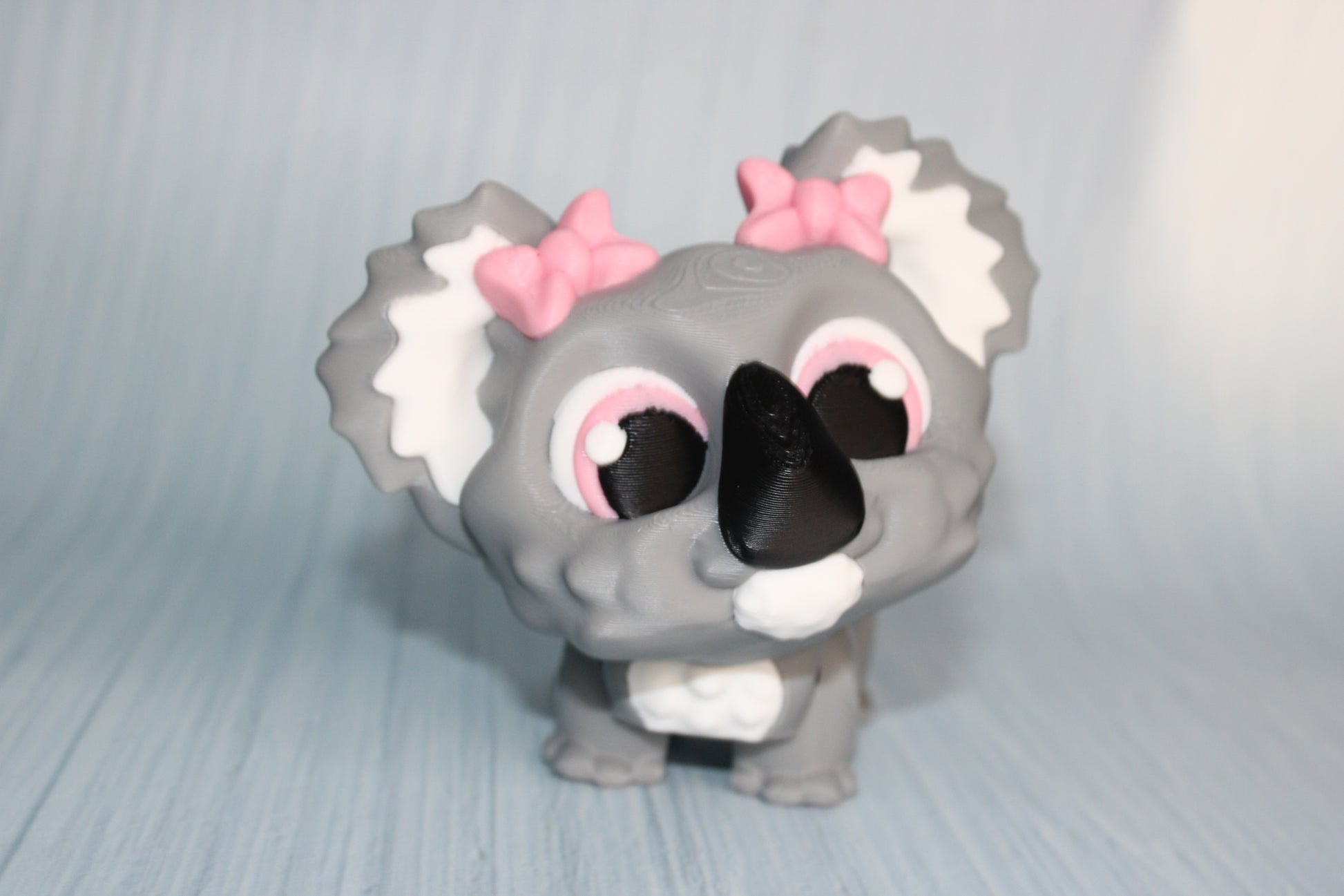 Awareness or Flower Koala – 3D printed, measuring 4.5" long by 3.5" tall. - Wonderland 3D Printing 