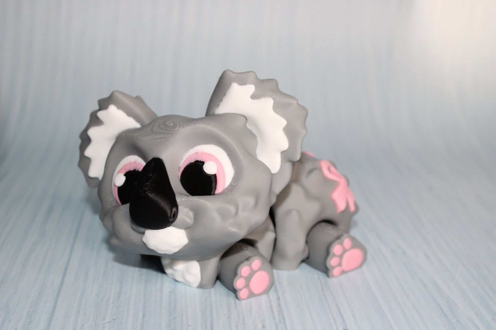 Awareness or Flower Koala – 3D printed, measuring 4.5" long by 3.5" tall. - Wonderland 3D Printing 