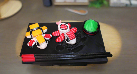 Sushi Turtles - Includes a tray, chopsticks, wasabi with bowl, one Tamago sushi turtle, and one Toro sushi turtle - 3D printed. - Wonderland 3D Printing 