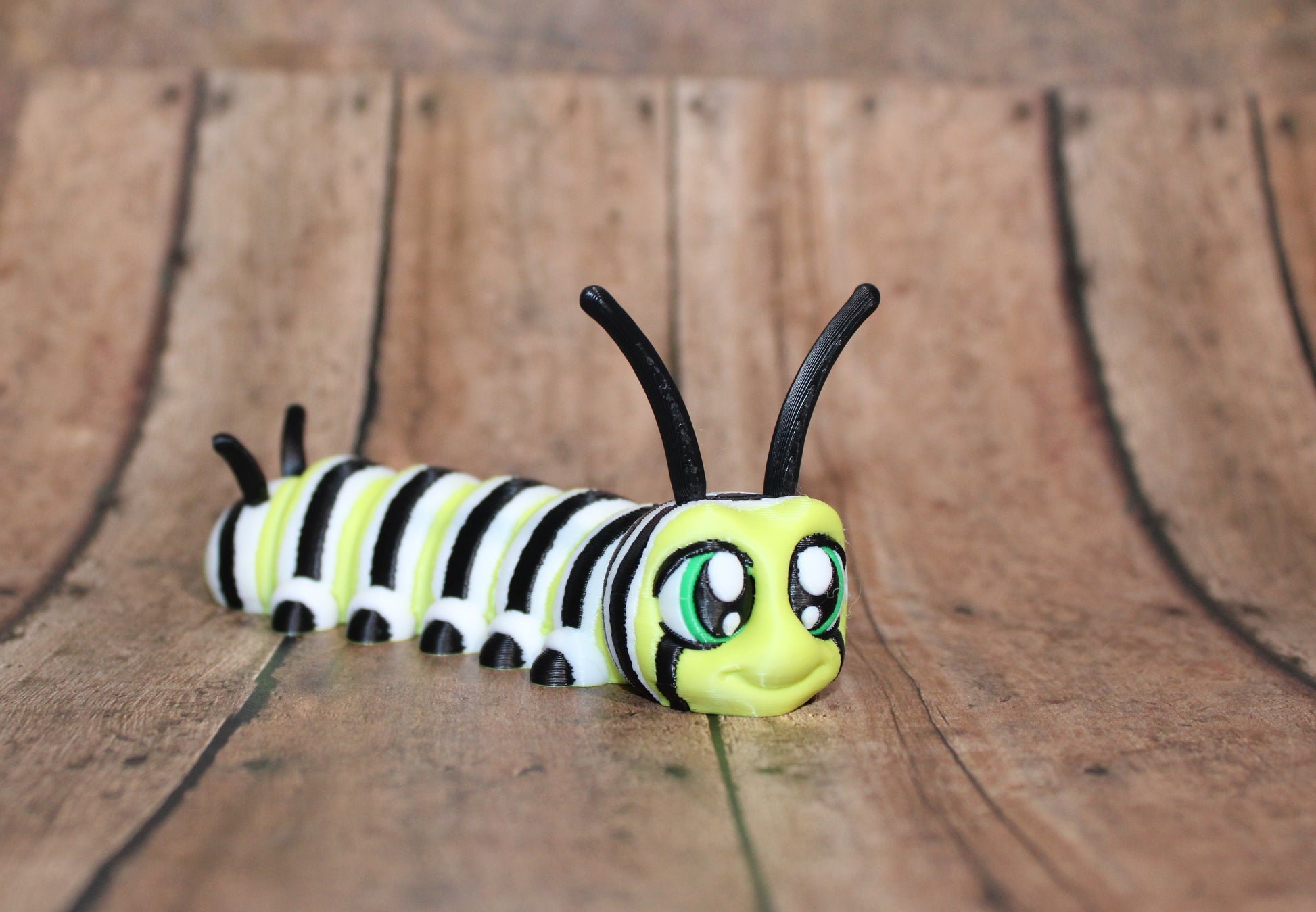 Monarch Caterpillar-4.25 inches Long- 3D Printed Articulated Flexi Fidget Figurine - Wonderland 3D Printing 