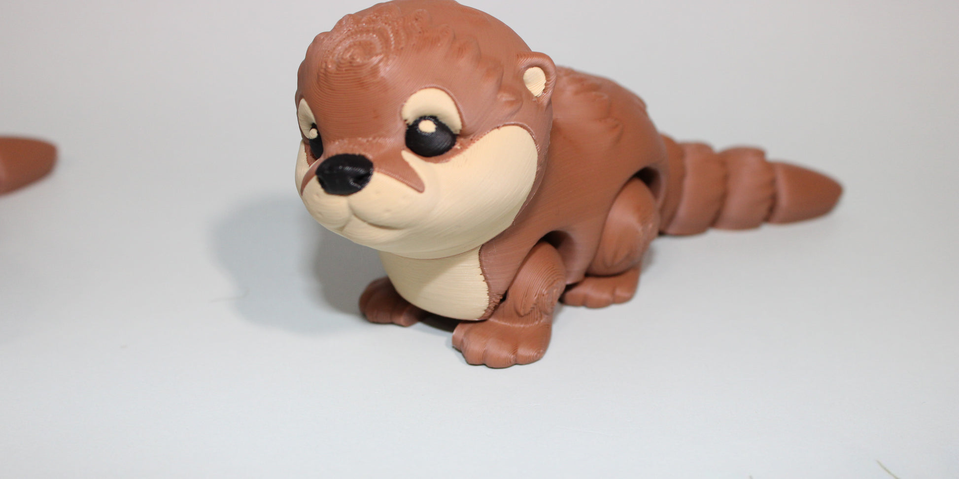 Baby Otter 4.5 inches long 3D Printed Articulated Flexi Fidget Figurine - Wonderland 3D Printing 