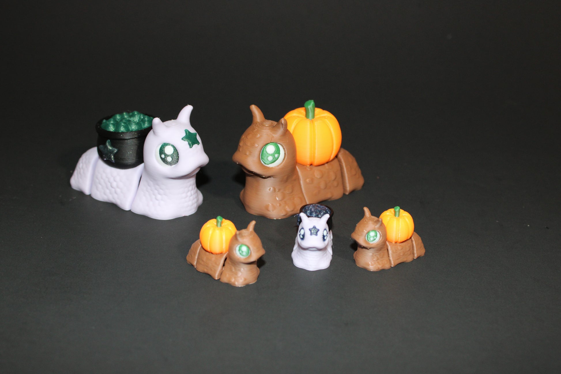 Spooky Snails all 3 included- 3D Printed Fidget Toy. 1 Pumpkin, 1 Cauldron, and 1 Skull - Wonderland 3D Printing 