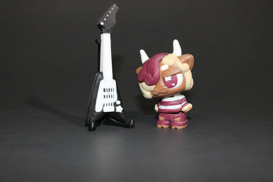 3D-printed Flexi Emo Cow with Guitar 2" Tall - Wonderland 3D Printing 